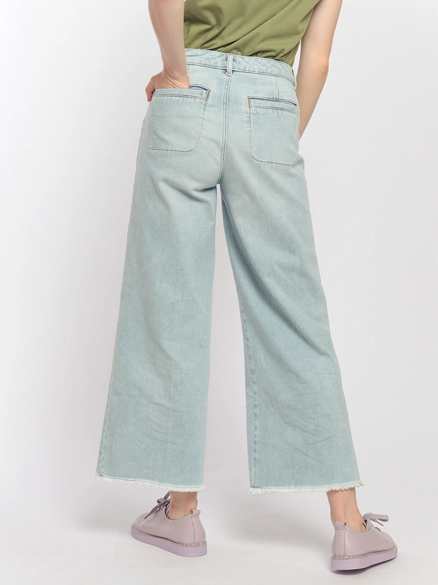 Расклешенные джинсы с бахромой